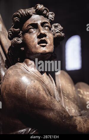 Wooden Evangelist Statue as a Pulpit decoration inside a church in Grimbergen Belgium by Flemish sculptor Hendrik Frans Verbruggen (1654-1724) Stock Photo