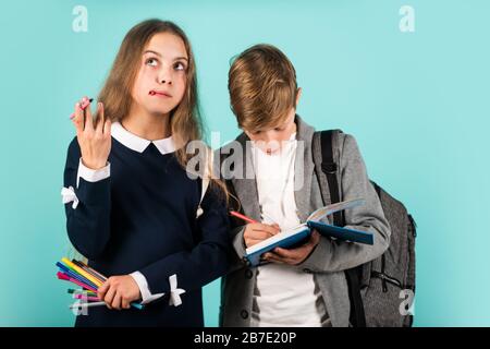 Study together. Student ready for lessons. Regular school program. School education for advanced level. Easy learning concept. International students exchange. School knowledge. Talent development. Stock Photo