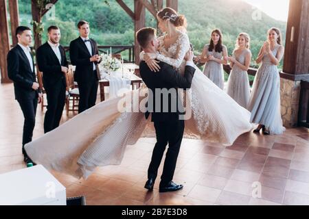 The first dance of the young. The bride and groom are dancing their first dance. Stock Photo