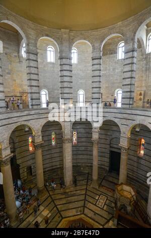 PISA, ITALY - August 14, 2019: The Baptistery of Pisa seen from the inside