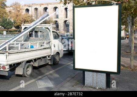 Empty rectangular bilboard. Photographed on the edge. Stock Photo