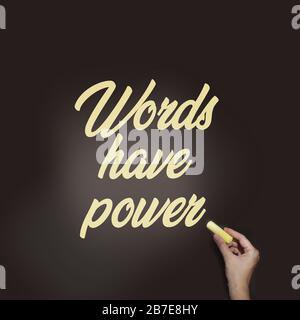 words have power written with woman's hand on blackboard. Copyrighting piar massmedia or communication concept Stock Photo