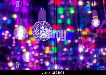 Red blue neon garlands of bokeh lights and reflections. Stock Photo