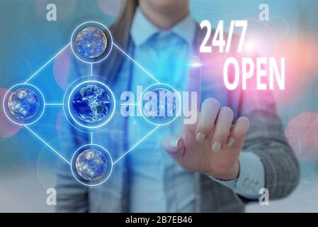 Handwriting text writing 24 Or 7 Open. Conceptual photo used to describe a service that is always available to serve Elements of this image furnished Stock Photo