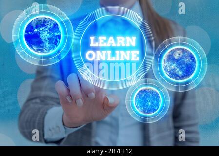 Handwriting text writing Learn Online. Conceptual photo education that takes place over the Internet or computer Elements of this image furnished by N Stock Photo
