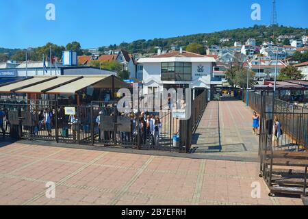 Kinaliada,Turkey - September 18th 2019. Passengers wait to board the ferry to Buyukada at Kinaliada ferry station in the Princes' Islands AKA Adalar Stock Photo