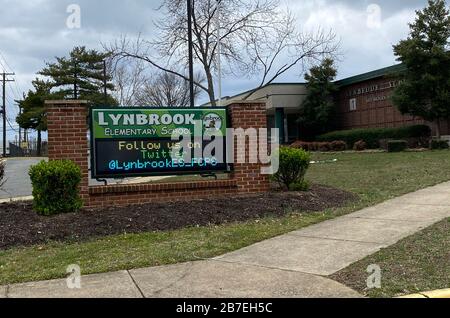 Springfield, VA, USA. 15th Mar, 2020. View of Lynbrook Elementary School where a Springfield-area teacher is one of the latest coronavirus cases in Virginia. The school will be closed and set to reopen April 10. March 15, 2020. Credit: Mpi34/Media Punch/Alamy Live News Stock Photo