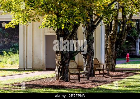 Hot Springs, VA historic downtown town village city park in Virginia countryside with old building architecture and empty benches Stock Photo