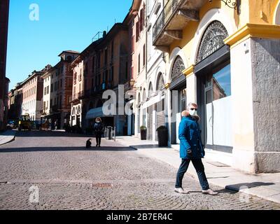 Cremona , Lombardy . Itay March 2020 Downtown and historical center . Few people in the streets during covid lockdown quarantine Stock Photo