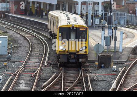 Merseyrail class 507 train leaving West Kirby railway station, Grange Road, West Kirby. Stock Photo