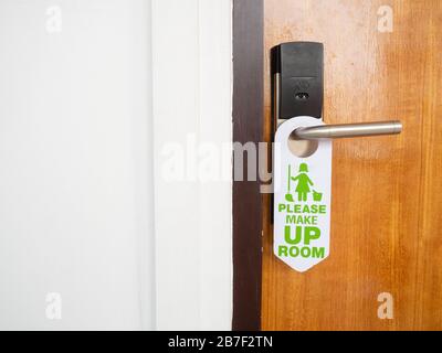 Do not disturb sign attached to the front of the room that is closed ...