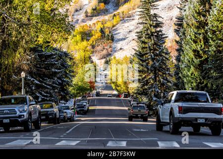 Aspen, USA - October 11, 2019: Small town in Colorado with cars parked on street in expensive famous city during autumn day in morning Stock Photo