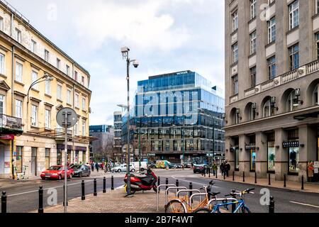 Warsaw, Poland - January 22, 2020: Wework co-working office space building in downtown old town of Warszawa with outside outdoor view on street road i Stock Photo
