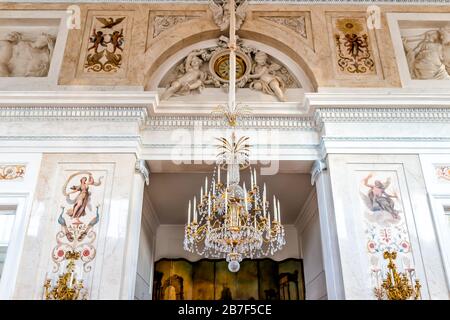 Warsaw, Poland - December 20, 2019: Grand interior of Palace on the Isle in Warszawa Lazienki or Royal Baths Park with chandelier lamp Stock Photo
