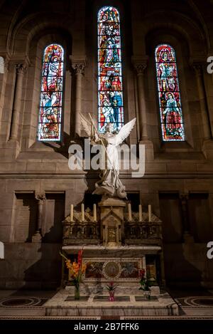 Statue of Saint Michael inside the Sacre Coeur Basilica in Paris, France, Europe Stock Photo