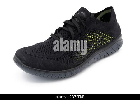 Black Free RN Flyknit ventilated summer sneaker isolated on white background Stock Photo