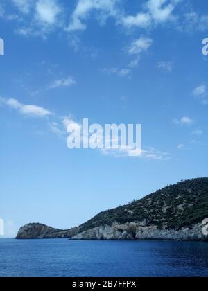 Kelyfos Turtle Island Vertical. Kelyfos island between Sithonia and Kassandra near Neos Marmaras. Stock Photo