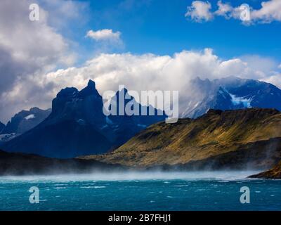 NATIONAL PARK TORRES DEL PAINE, CHILE - CIRCA FEBRUARY 2019: Strong winds of Patagonia over the Paine River in Torres del Paine National Park, Chile. Stock Photo