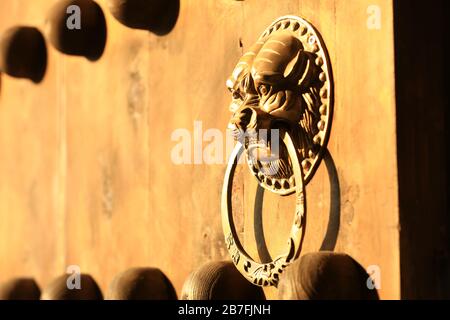 The ancient Chinese architecture copper door knocker Stock Photo