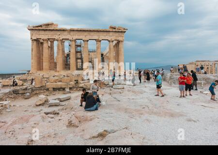 Tourists take selfies and photos at The Acropolis of Athens, Greece Stock Photo