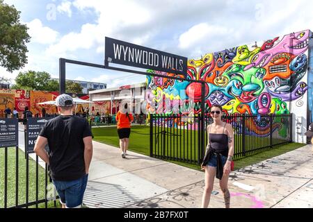Visitors at the Wynwood Walls main entrance, Wynwood Art District, Miami, Florida, UK. Stock Photo