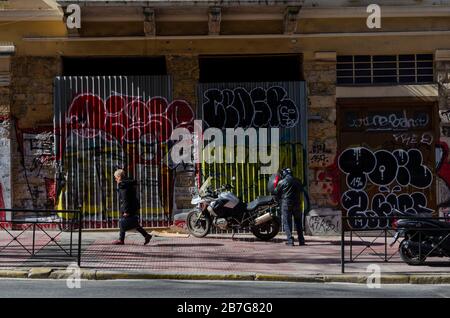 ATHENS, GREECE - 03 Mar 2020 - People in a busy thoroughfare in central Athens Greece Stock Photo