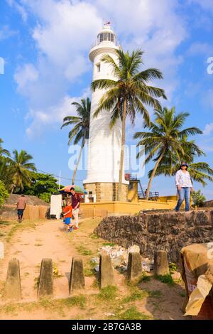 South Asia Sri Lanka Fort Galle colonial town centre old ancient harbour port white lighthouse built 1939 87 ft 26 m high Point Utrecht Bastion Stock Photo