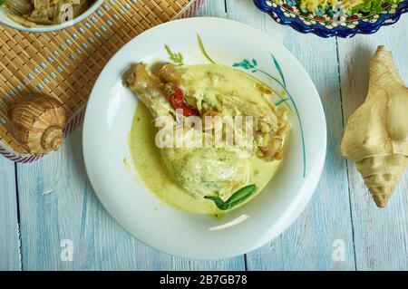 Kukul mas curry, Sri Lankan Chicken Curry, Sri Lankan   cuisine, Traditional assorted  dishes, Top view. Stock Photo