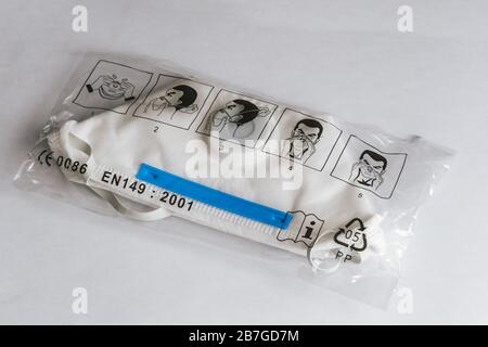 Vienna, Austria - March 16 2020: Disposable FFP3 Clinical Safety Mask against COVID-19 Corona Virus Infection Sealed in Original, Individual Packaging Stock Photo