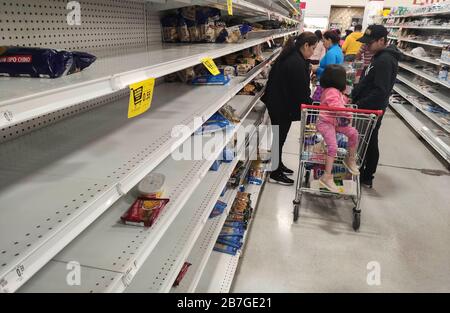 (200316) -- QUITO, March 16, 2020 (Xinhua) -- Shelves are nearly empty in a supermarket in Quito, Ecuador, March 15, 2020.  Ecuador has confirmed nine new cases of the virus, bringing the total to 37, with two fatalities.     Ecuador's Ministry of Foreign Affairs announced a 'total suspension' of incoming passenger flights starting from March 17 to April 5. The ban 'will not include cargo flights solely carrying merchandise, correspondence, postal shipments or humanitarian aid,' according to authorities. (Photo by Santiago Armas/Xinhua) Stock Photo