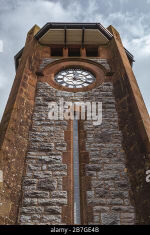 The clock tower in Grange-over-sands in a close up from the base Stock Photo