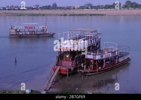 Empty tourist riverboats on the Tonle Sap River during the coronavirus pandemic. Phnom Penh, Cambodia, Indochina. © Kraig Lieb Stock Photo