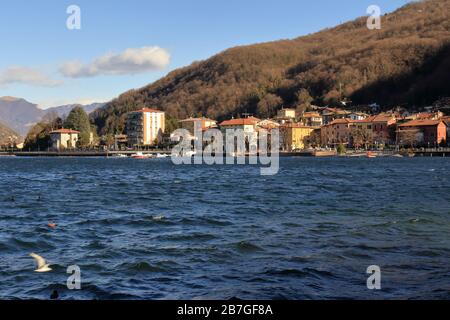 View of Porto Ceresio (Varese), Italy, with Lugano lake and village. Stock Photo