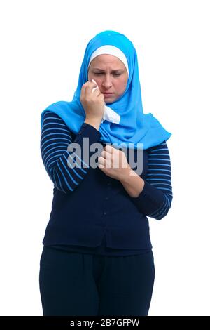 Sad stressed arab woman mourning crying alone isolated on white background, upset desperate woman grieving weeping suffering from anxiety grief Stock Photo