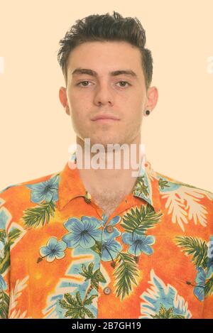 Face of young handsome man wearing Hawaiian shirt Stock Photo - Alamy