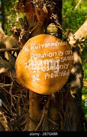 Asia Sri Lanka Polonnaruwa Dipauyana Island Park Gardens sign green environmental message Pollution is an Incurable Disease it can only be Prevented Stock Photo