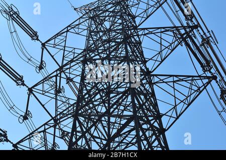 power transmission tower closeup - high voltage electricity pole/grid Stock Photo