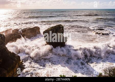 Crashing surf and waves at Punakaiki, West Coast, New Zealand Stock Photo