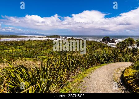 Wide view over Tauranga Bay, West Coast, New Zealand Stock Photo