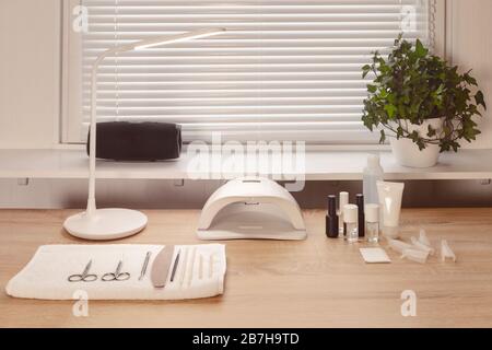 Interior of empty modern nail work place. Work places for masters of manicure Stock Photo