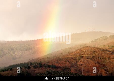 rainbow over the mountains in basque country Stock Photo