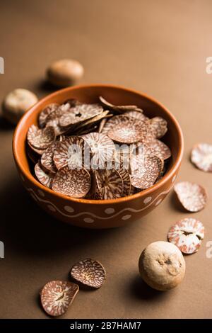 Betel nut chips in a bowl also known as slices of supari in india, used in Paan masala Stock Photo