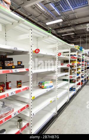 16 March 2020 - London, UK - Empty supermarket shelves at ASDA Stepney as people panic buy to stock up during the Coronavirus outbreak Stock Photo