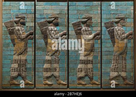 Frieze of archers from the palace of the Persian King Darius I in Susa on display in the Louvre Museum in Paris, France. Stock Photo
