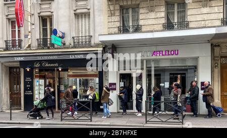 PARISIANS QUEUE FOR FOOD AT SUPERMARKET AFTER CORONAVIRUS OUTBREAK , PARIS  FRANCE Stock Photo