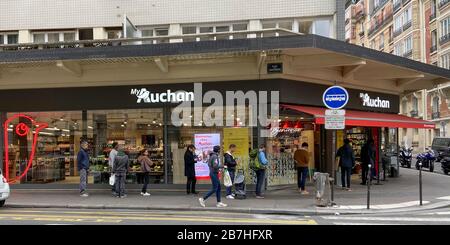 PARISIANS QUEUE FOR FOOD AT SUPERMARKET AFTER CORONAVIRUS OUTBREAK , PARIS  FRANCE Stock Photo