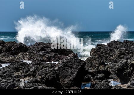 Waves crashing on rocks along the Pacific coast line in Panaama