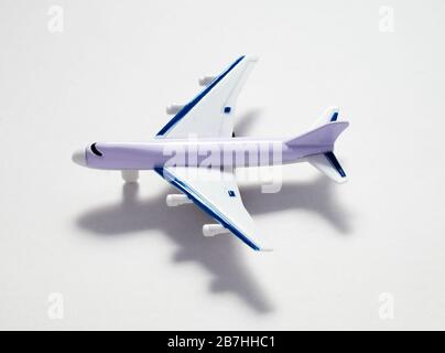 toy passenger plane on a white background close-up Stock Photo