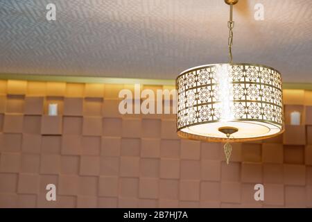 Modern 3-Light Led yellow Chandelier. Pendant Sconce Lighting Lamp . Ceiling Light Oval Pendant Light Fixture. Hanging Lights with Creme Fabric Shade. Stock Photo