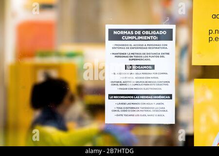 Gijon, Spain. 16th February, 2020. A letters advising the safety conditions at the window of a supermarket on February 16, 2020 in Gijon, Spain, after Spanish government approved Spain’s state of alarm decree to confine the whole country and reduce coronavirus infections. Coronavirus COVID-19 infections in Spain increase 1.000 in a day to reach 9.190, with more than 300 deaths. ©David Gato/Alamy Live News Stock Photo